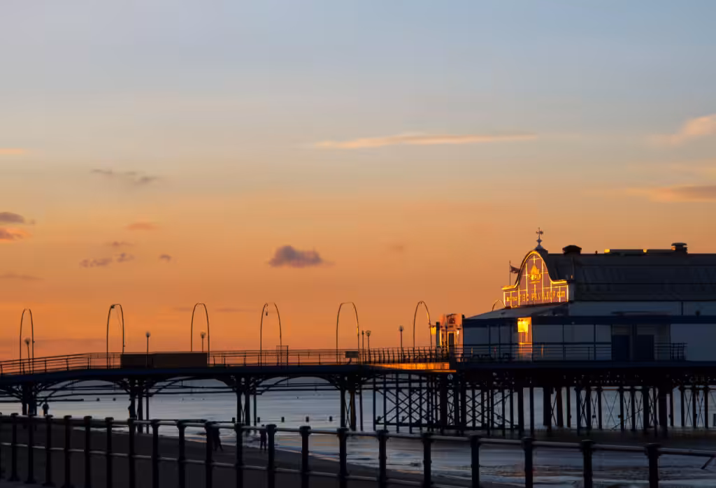 seaside pier in cleethorpes at sunset