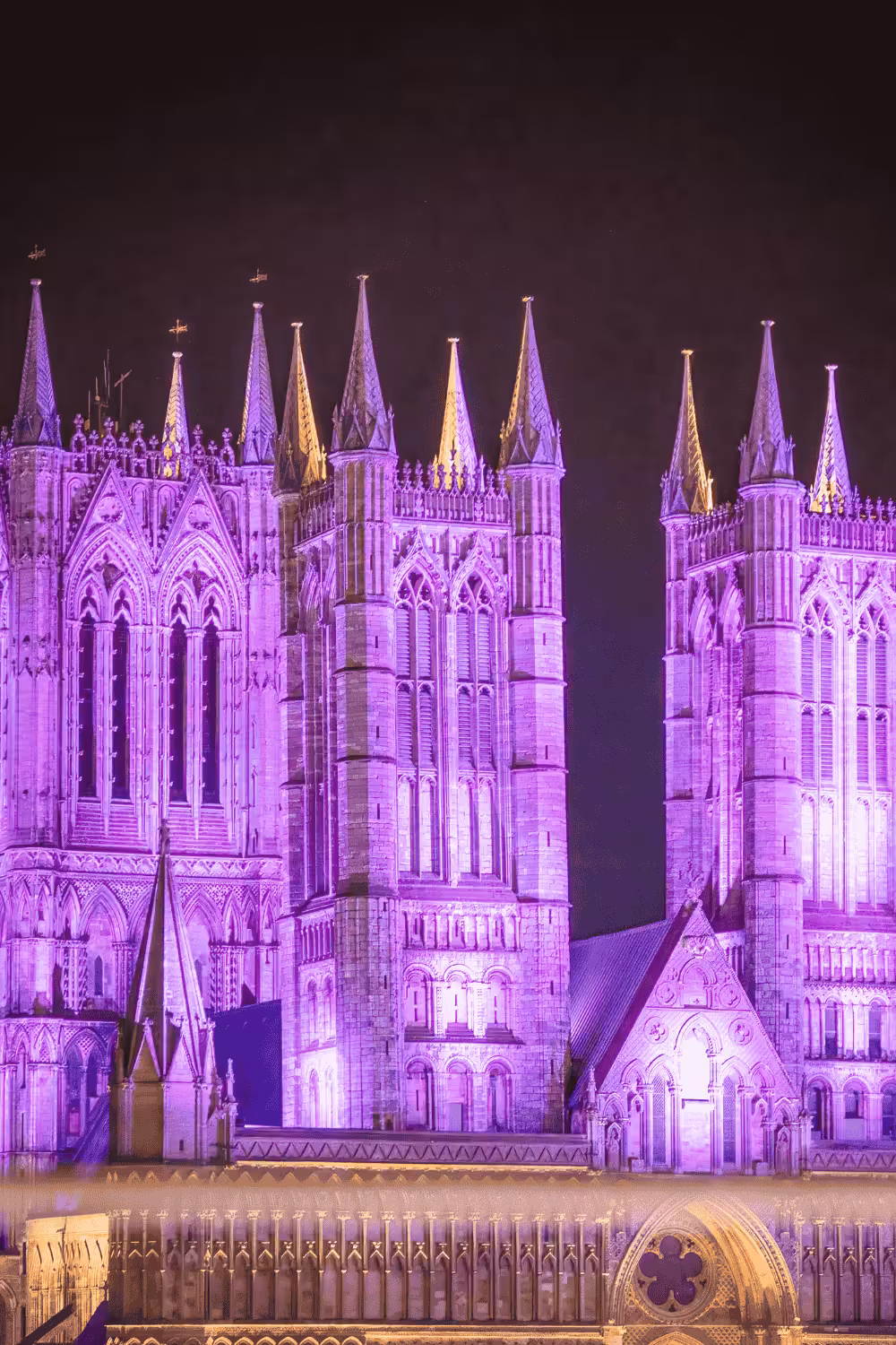 Lincoln cathedral lit up purple for the Christmas Light show