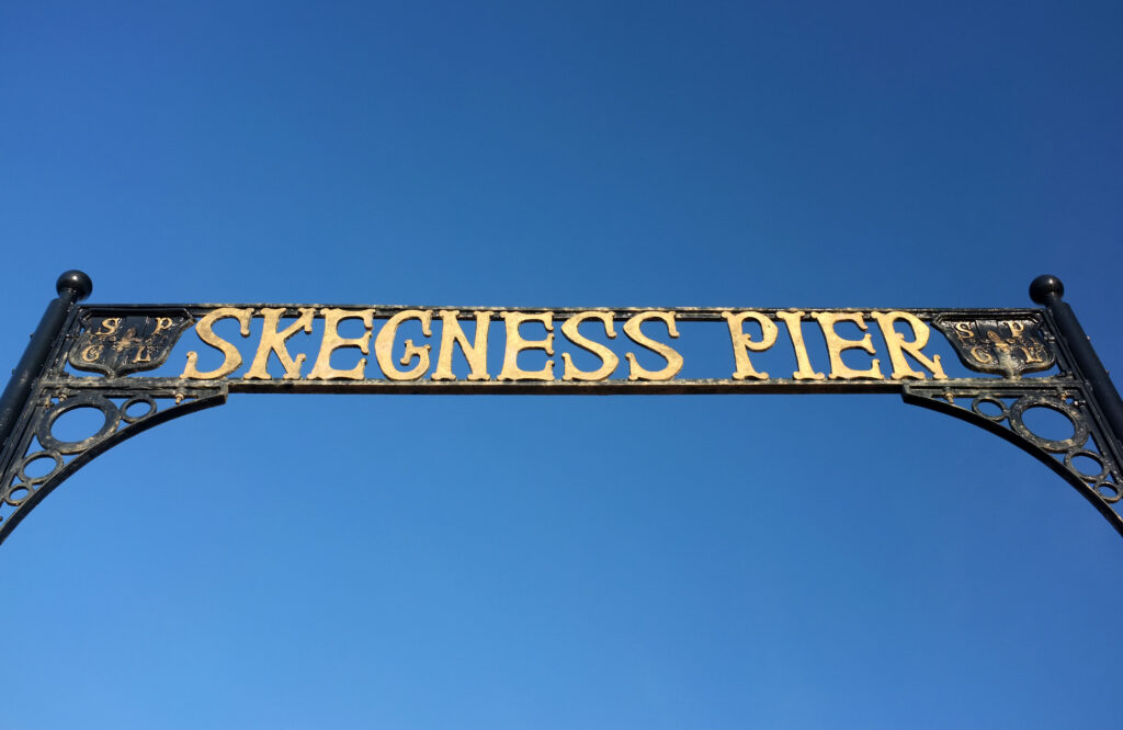A sign that says 'Skegness pier'