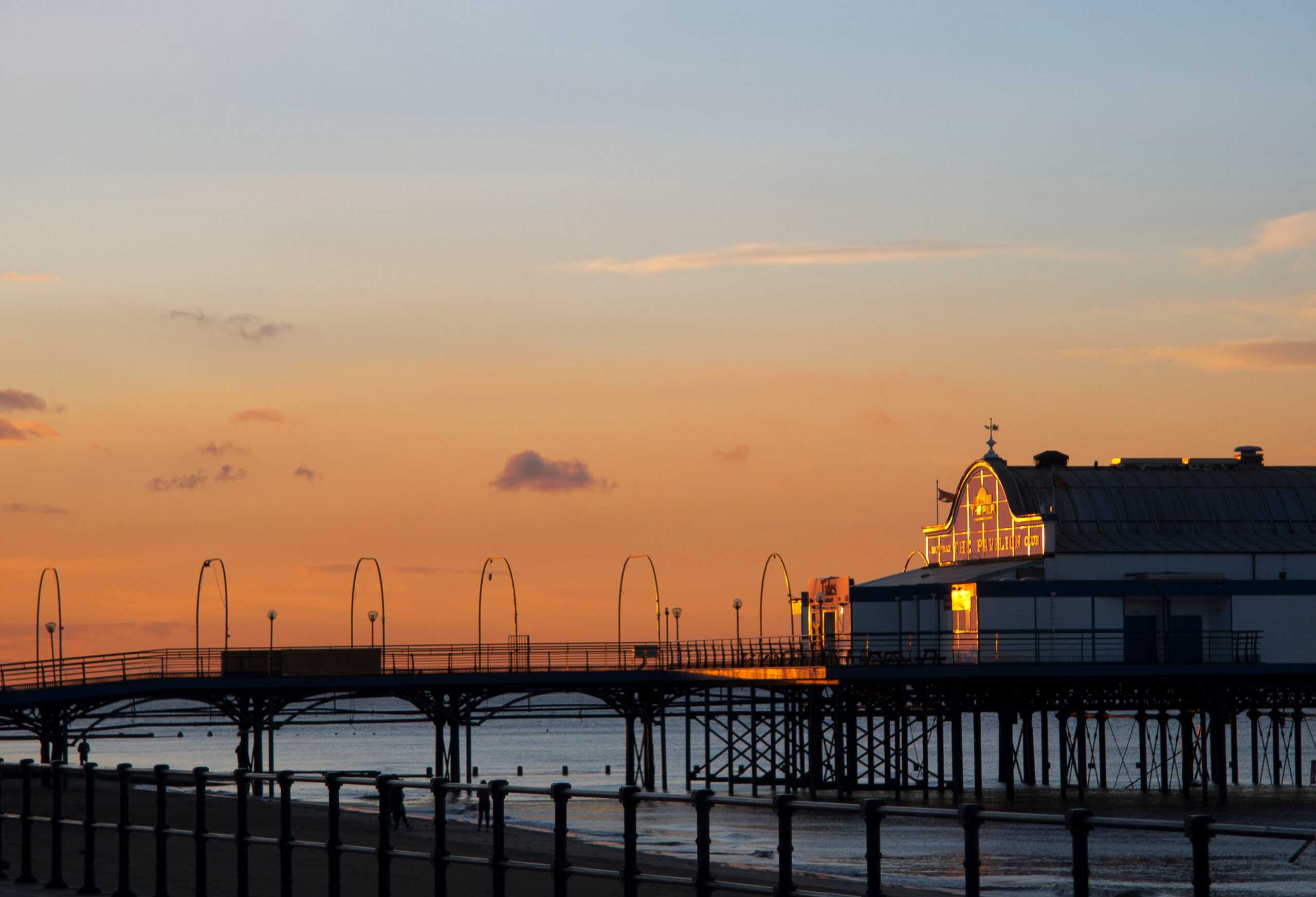 seaside pier in cleethorpes at sunset